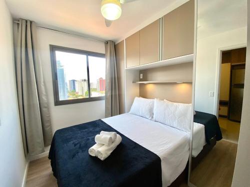 Un pat sau paturi într-o cameră la V1111 · V1111 - Sua casa em SP: pertinho do metrô!