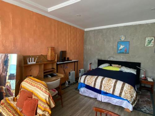 Ένα ή περισσότερα κρεβάτια σε δωμάτιο στο NUESTRA CASA - OUR HOME Suite-Studio Cuenca by A2CC