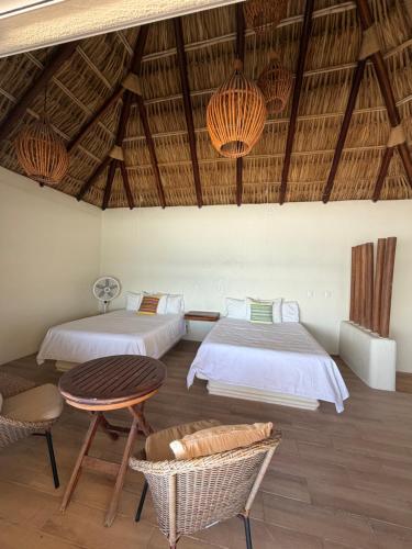 Ένα ή περισσότερα κρεβάτια σε δωμάτιο στο Hotel Estrella de Mar