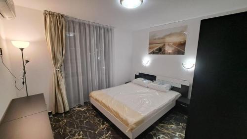 Ένα ή περισσότερα κρεβάτια σε δωμάτιο στο Luxe 1 Dubai Penthouse