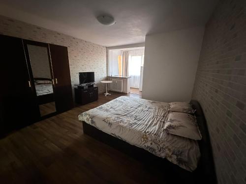 Postel nebo postele na pokoji v ubytování Room view Craiova