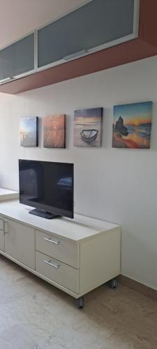 TV a/nebo společenská místnost v ubytování Raggio di Sole