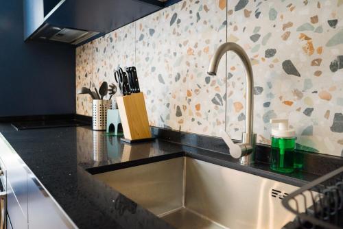 Η κουζίνα ή μικρή κουζίνα στο 8550 Las Condes Suites by Andes STR