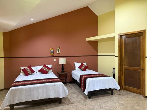 Postel nebo postele na pokoji v ubytování Aranwa Sarapiquí Rainforest Lodge