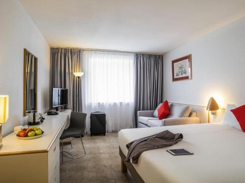 Postel nebo postele na pokoji v ubytování Novotel Glasgow Centre