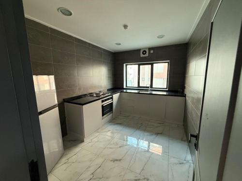 Kuchyň nebo kuchyňský kout v ubytování Atelier Tower Hoora - Family Apartment