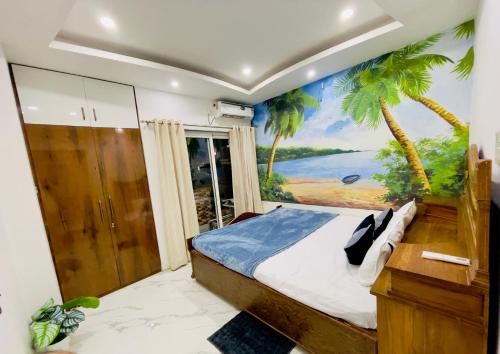 een slaapkamer met een bed met een schilderij aan de muur bij The Metro Nest in Guwahati