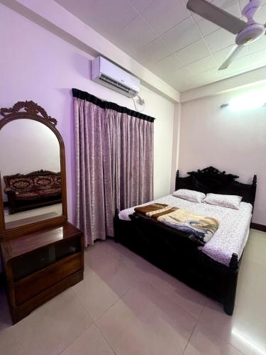 Ένα ή περισσότερα κρεβάτια σε δωμάτιο στο 5-Star Hospitality with a Heart