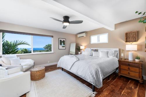 Ένα ή περισσότερα κρεβάτια σε δωμάτιο στο Hale Pualani