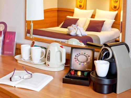 Postel nebo postele na pokoji v ubytování Mercure Cieszyn