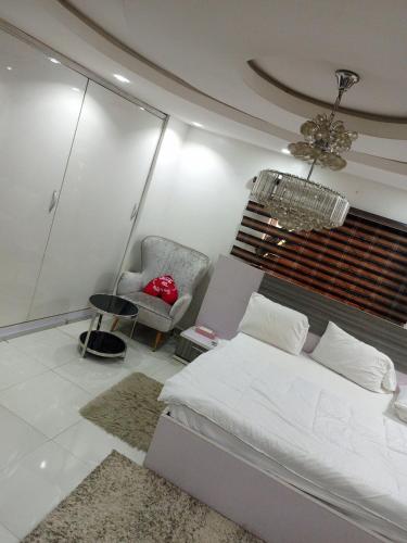 Ένα ή περισσότερα κρεβάτια σε δωμάτιο στο TheGeneral Place