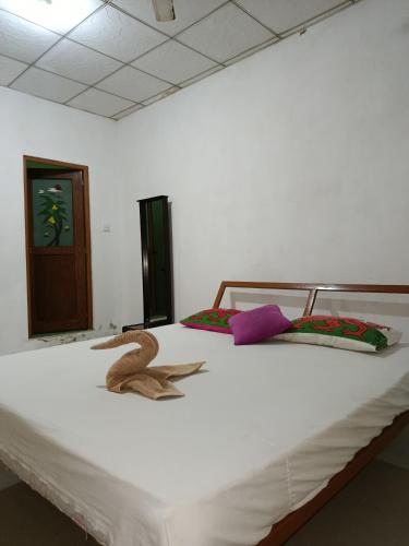 Postel nebo postele na pokoji v ubytování Yala Safari Green Hotel One