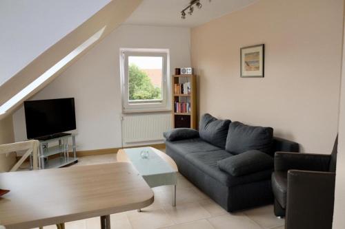 TV a/nebo společenská místnost v ubytování Meeresgruß