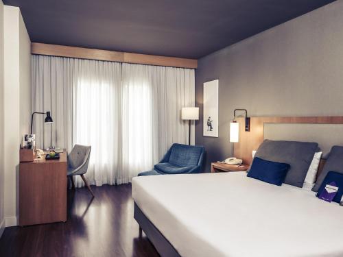 Ένα ή περισσότερα κρεβάτια σε δωμάτιο στο Mercure Campinas