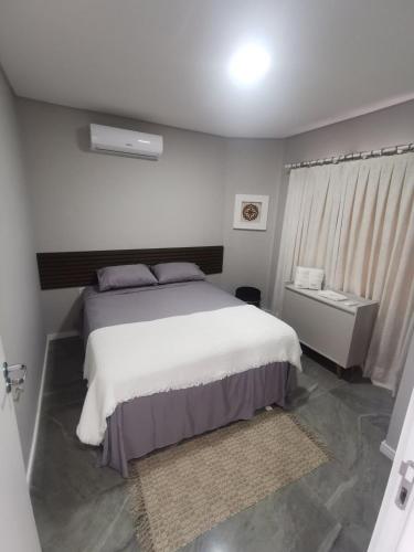 Ένα ή περισσότερα κρεβάτια σε δωμάτιο στο Katarina casa