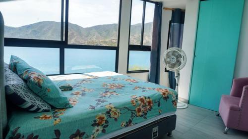Postel nebo postele na pokoji v ubytování Casa frente al mar en la montaña