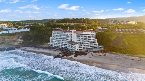 an aerial view of a hotel on the beach at Inn at Spanish Head Resort Hotel in Lincoln City