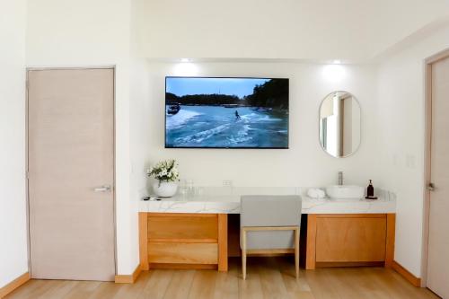 TV a/nebo společenská místnost v ubytování Acuaski