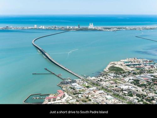 an aerial view of a bridge over a body of water at Fully Furnished 3BR and 2BA Gem Near Airport & Mall in McAllen