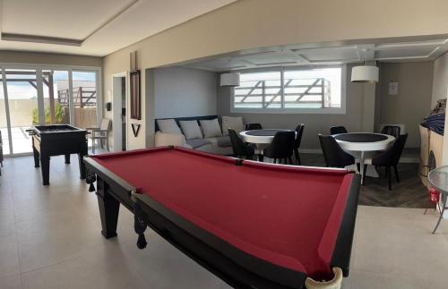 Biliár nebo kulečník v ubytování Apartment com Piscina 2 quadras da beira-mar
