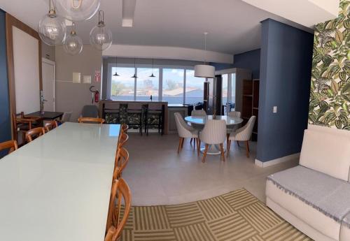 Posezení v ubytování Apartment com Piscina 2 quadras da beira-mar