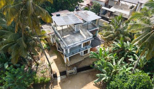 an overhead view of a house with solar panels on it at Ivy Garden Retreat in Gampola