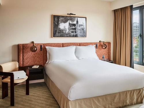 Postel nebo postele na pokoji v ubytování Sofitel Brussels Europe
