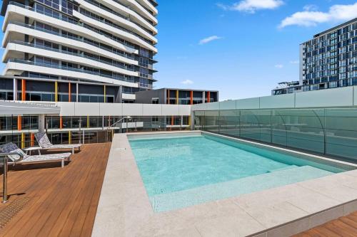 a swimming pool on the roof of a building at Cityview Escape Poolside Living near CBD and Beach in North Wollongong