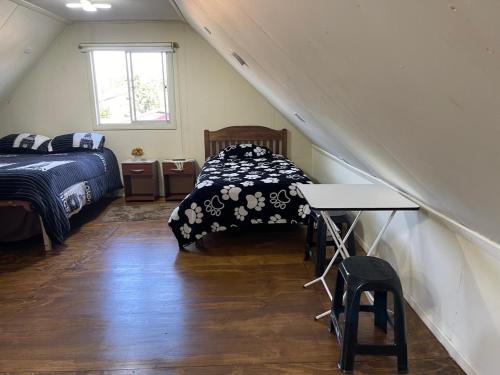 Postel nebo postele na pokoji v ubytování Alojamiento 2 Oriente