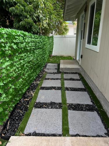 a walkway in front of a house at Honolulu Studio City Vibez in Honolulu