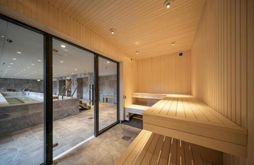 Ένα ή περισσότερα κρεβάτια σε δωμάτιο στο Skyline Premium Suites