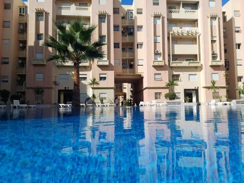 Bazén v ubytování Appartement avec piscine à Mohammedia Plage à 5min nebo v jeho okolí