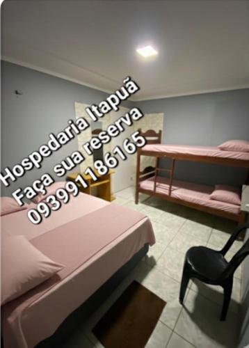 Postel nebo postele na pokoji v ubytování HOSPEDARIA ITAPUÃ
