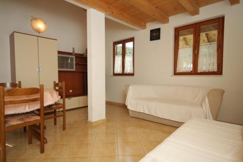 Ένα ή περισσότερα κρεβάτια σε δωμάτιο στο Apartment Vis 2435b