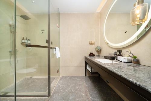 Koupelna v ubytování 南宁江南万达白沙大道怡程酒店