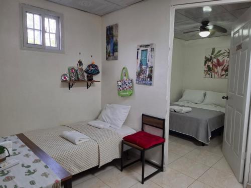 Postel nebo postele na pokoji v ubytování Casa Lilia Airport