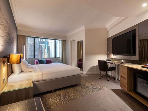 Postel nebo postele na pokoji v ubytování Novotel Kuala Lumpur City Centre