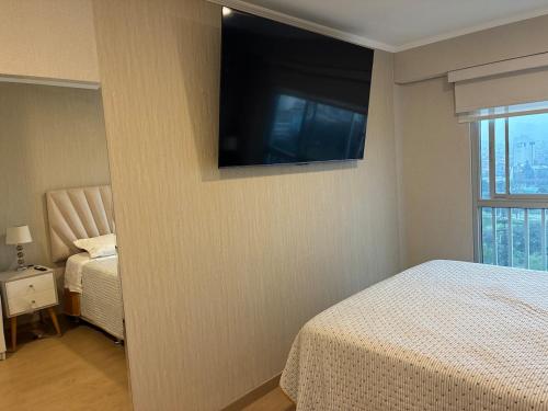 Voodi või voodid majutusasutuse Magical View Parque de las Aguas, central apartment toas