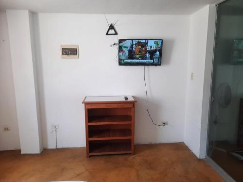 TV a/nebo společenská místnost v ubytování Hospedaje Kaihalulu