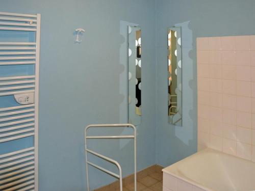a bathroom with a shower with a tub and a sink at Charmante maison de campagne en Touraine avec jardin privatif - FR-1-381-288 in Chaveignes