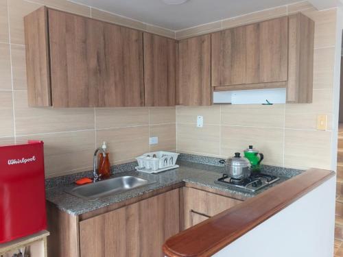 Η κουζίνα ή μικρή κουζίνα στο La Arboleda Apartamento