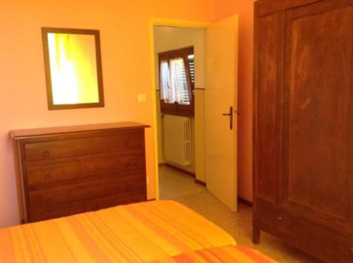 Cama o camas de una habitación en Ferienhaus In Salò Mit Grill, Terrasse Und Garten