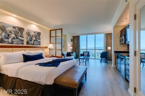 Ένα ή περισσότερα κρεβάτια σε δωμάτιο στο New Mgm Signature Condo