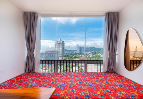 En eller flere senge i et værelse på Simpsons Homestay - Oasky