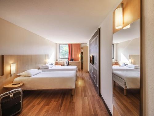 Postel nebo postele na pokoji v ubytování Ibis Sarlat Centre