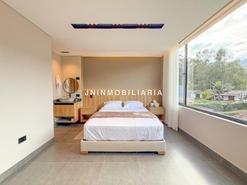 Postel nebo postele na pokoji v ubytování Apartamento de lujo a 3 minutos del Aeropuerto JMC 201