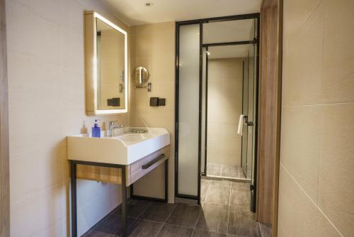 Ένα μπάνιο στο Hanting Hotel Beijing South Railway Station Muxiyuan