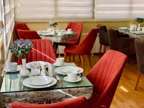 Χώρος καθιστικού στο Clover Hotel