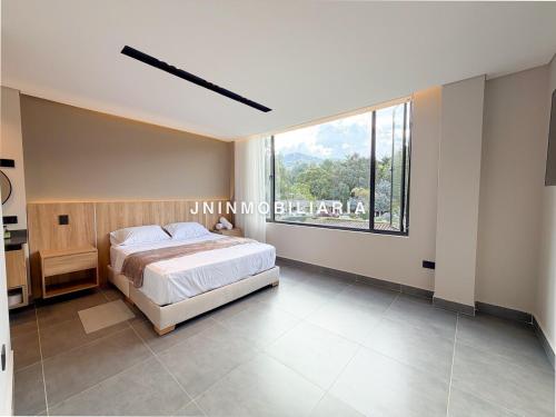 Postel nebo postele na pokoji v ubytování Apartamento de lujo a 3 minutos del Aeropuerto JMC 202