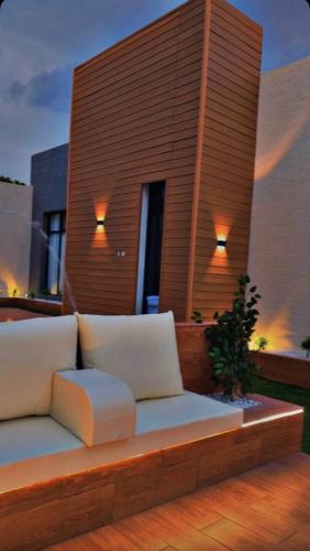 a couch sitting on top of a building at شاليهات سمو بارك in Taif